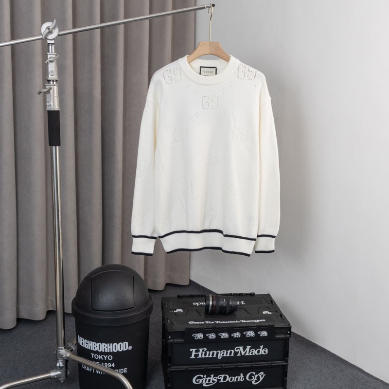 G*u*i sweaters